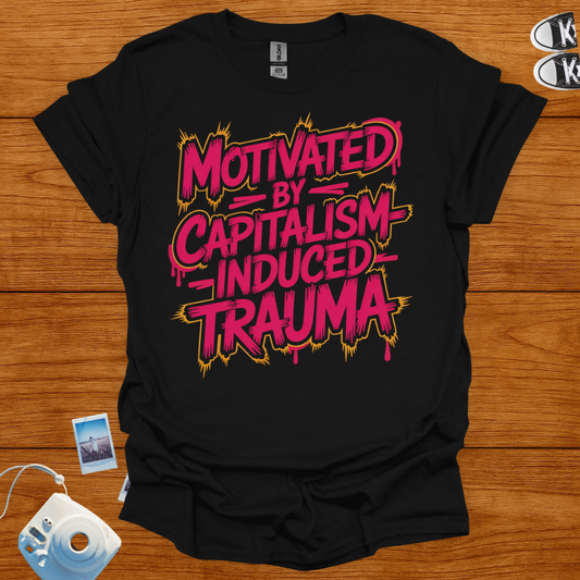 Black t-shirt with pink and yellow text on a wooden surface