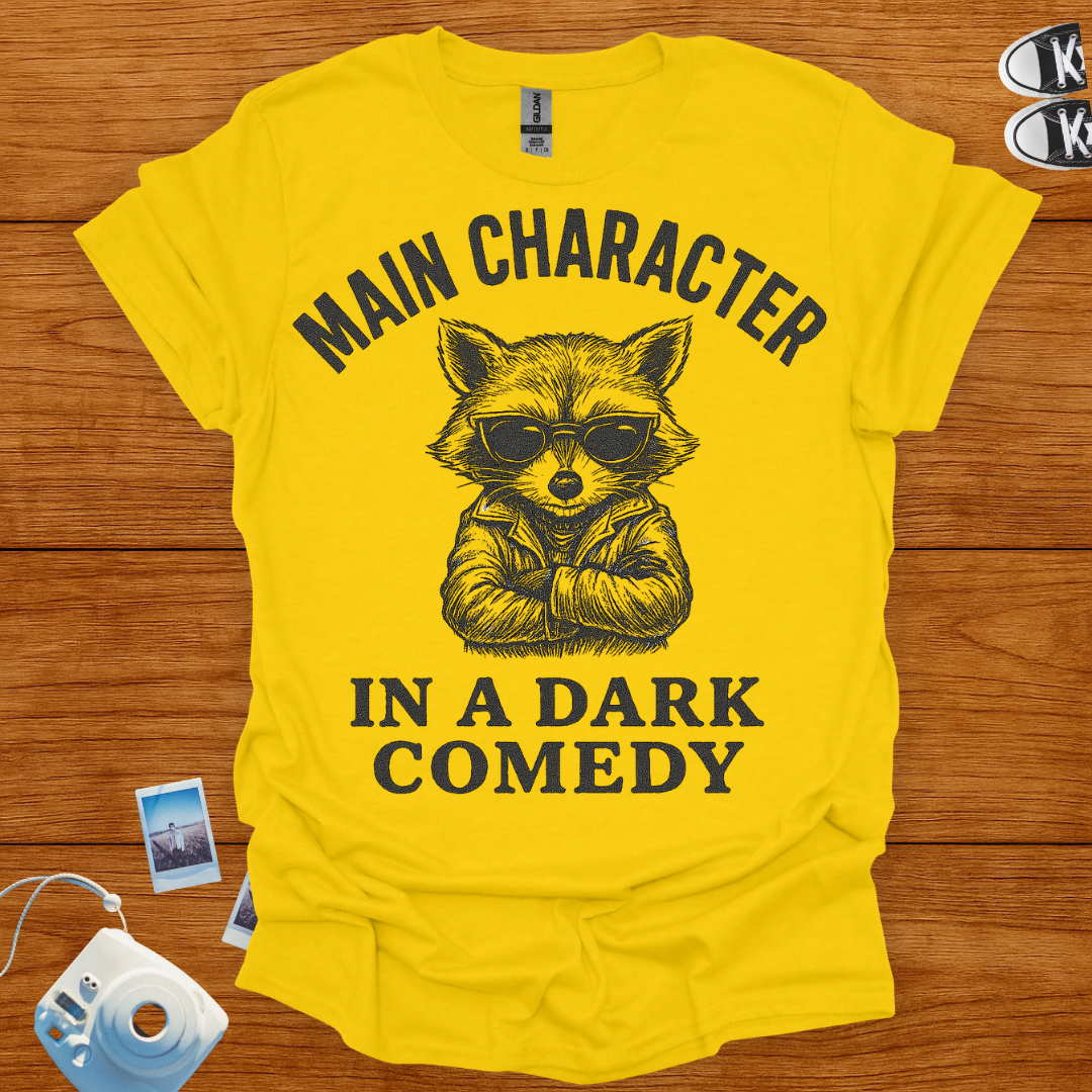 Main Character in a Dark Comedy T-shirt (Raccoon)