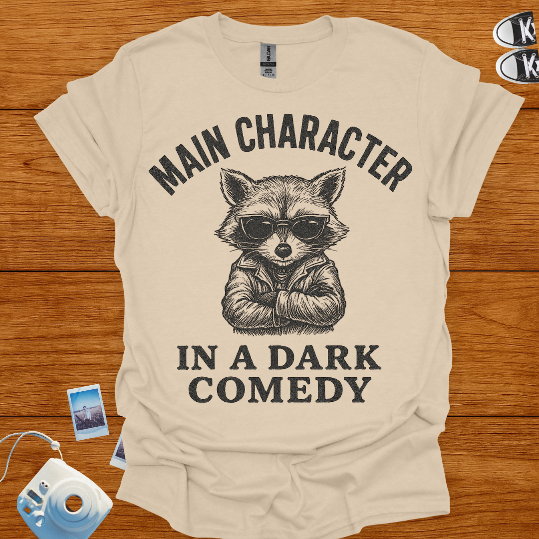 Main Character in a Dark Comedy T-shirt (Raccoon)