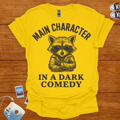 Main Character in a Dark Comedy T-shirt (Raccoon)