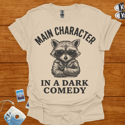 Main Character in a Dark Comedy T-shirt (Raccoon)